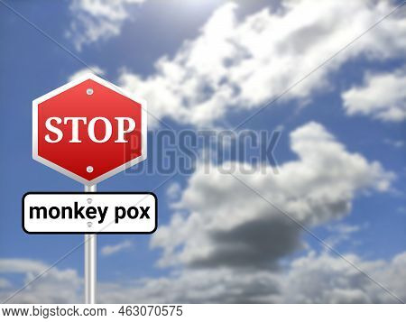 Stop Monkey Pox Sigh Board On Blur Sky Background. Monkey Pox Skin Disease Outbreak Background.