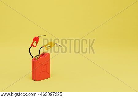 Storage Of Automobile Fuel In Canisters. Canister With Refueling Pistols On A Yellow Background. Cop
