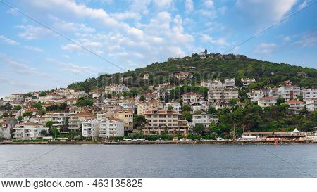 View Of The Mountains Of Kinaliada Island From Marmara Sea, With Traditional Summer Houses And Boats