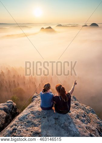 Kleiner Winterberg, Germany. June 27 2021. Brave Girls Enjoy Breakfast On Mountain Summit Above Mist