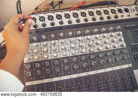 Production Sound Engineer Woman Hands Adjusting Volume Equalizer Voice, Mixing Console. Dj Sound Eng