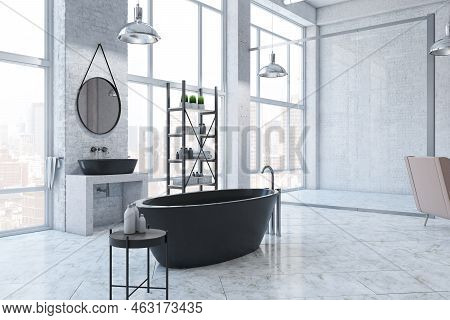 Perspective View On Modern Black Bath In Huge Sunlit Loft Style Bathroom With Metallic Furniture, Ro