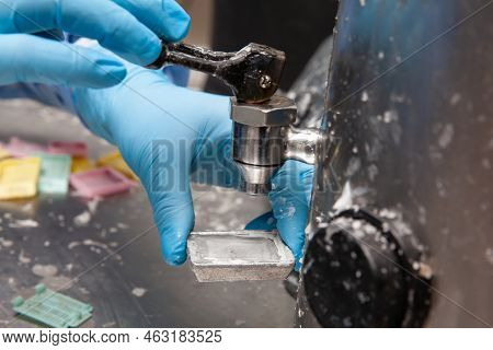 Scientist Embedding Tissues In Paraffin Blocks For Sectioning. Pathology Laboratory. Cancer Diagnosi