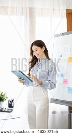 Office worker with a beautiful Asian woman in a private office, Daily routine of office workers, Wel
