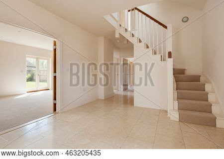 Swavesey, Cambridgeshire, England - May 21 2019: Unfurnished Reception Entrance Hall Within Unoccupi