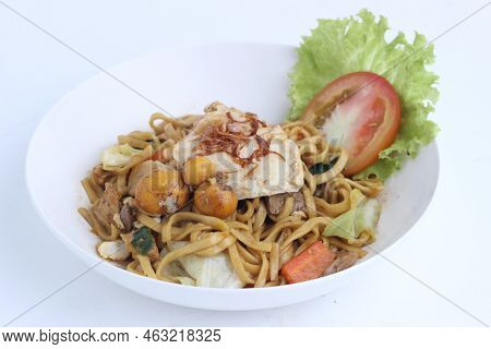 Bakmie Jawa  Indonesian Traditional Street Food Fried Noodle With Eggs Isolated On White Background.
