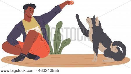 Male Pet Owner With Dog Training, Playing With Ball. Caring For Four-footed Friend Concept. Happy Gu