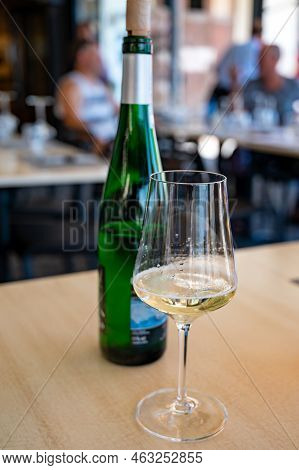 Drinking Of Txakoli Or Chacolí Slightly Sparkling Very Dry White Wine Produced In Spanish Basque Cou