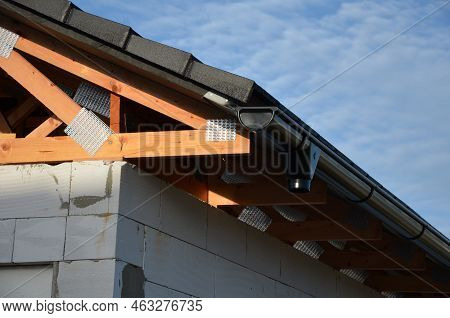 The Trusses Are Made From High-quality, Strength-graded Lumber And Connected By Steel Buttplates Wit
