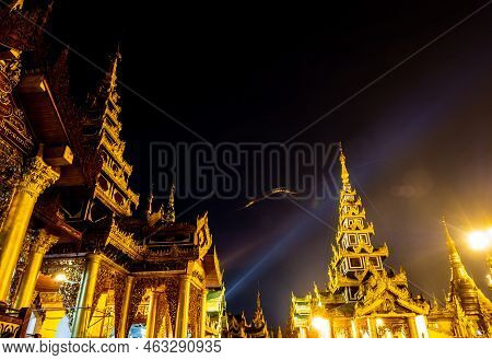 The Golden Pagodas And Mondops Are Illuminated In The Light Of The Night