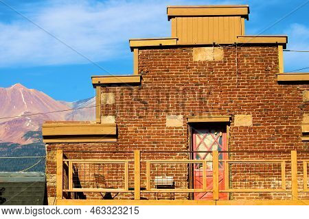 Historical Brick Building With Mt Shasta Beyond Taken In Mt Shasta City, Ca