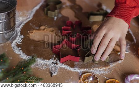 Closeup Childrens Hands Make Christmas Ginger Cookies.