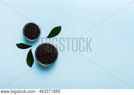 Quinoa Seeds In Bowl On Colored Background. Healthy Kinwa In Small Bowl. Healthy Superfood.