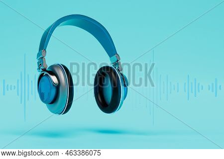 Listening To Music Tracks In Headphones. Headphones And Track Track On A Blue Background. Copy Paste