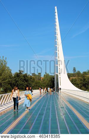 October 7, 2022 In Redding, Ca:  People Walking On The Modern Sundial Bridge Over The Sacramento Riv
