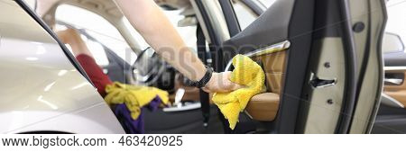 Car Wash Service Worker Wipes Car Door With Rag Wipes. Washing And Drying Car With Dry Trim Concept