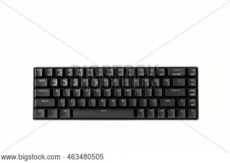 Small Compact Black Gaming Computer Keyboard On A White Background. Keyboard With Mechanical Switche