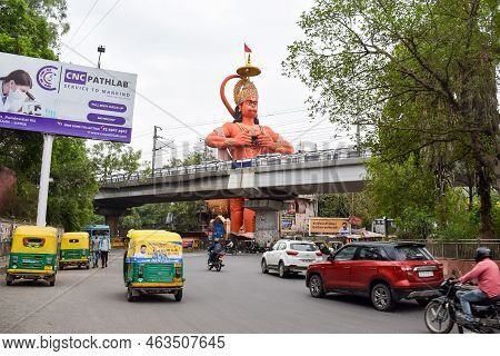 New Delhi, India - June 21, 2022 - Big Statue Of Lord Hanuman Near The Delhi Metro Bridge Situated N