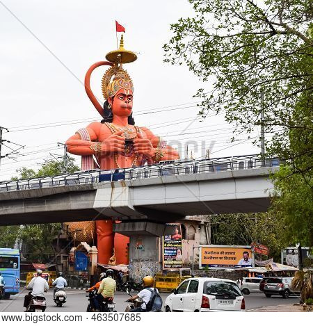 New Delhi, India - June 21, 2022 - Big Statue Of Lord Hanuman Near The Delhi Metro Bridge Situated N
