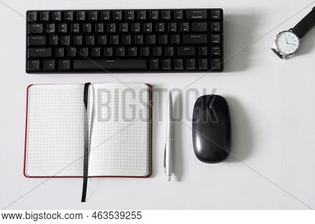 Portable Mechanical Wireless Computer Keyboard With Multimedia Keys On A White Background Next To A 