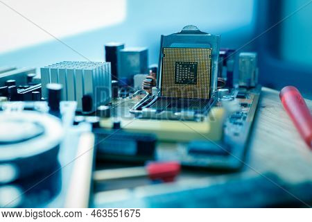 Selective Focus Computer Chip On Socket. Chipset On Electronic Circuit Board Of Pc Motherboard At Re