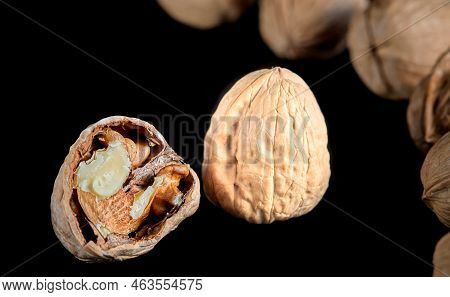 Walnut Photography On A Black Background Photographed Close-up