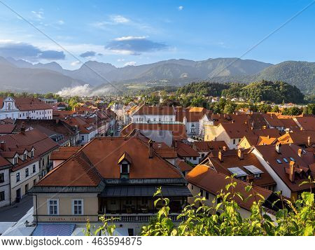 Kamnik, Slovenia - June 24, 2022: View On Historical Town Kamnik With Alps Mountain In The Backgroun