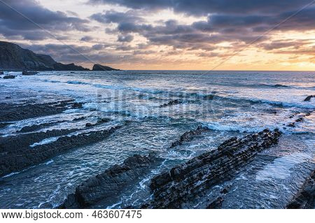 Beautiful Aerial Drone Landscape Sunset Image Of Welcombe Mouth Beach In Devon England