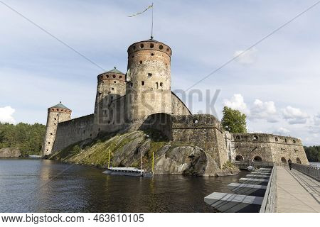 View Of Castle In Lake At Olavinlinna
