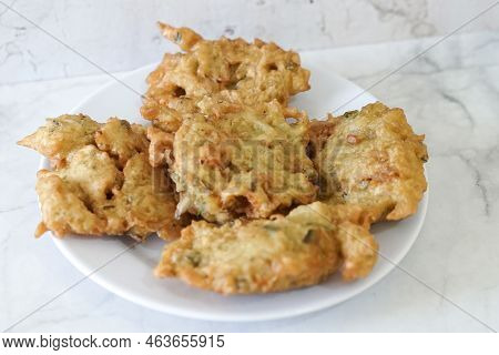 Bakwan Goreng, Fried Food, Indonesian Traditional Street Food Snacks. Fried Vegetables Dough Fritter