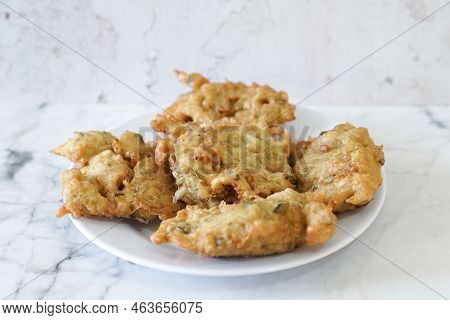 Bakwan Goreng, Fried Food, Indonesian Traditional Street Food Snacks. Fried Vegetables Dough Fritter