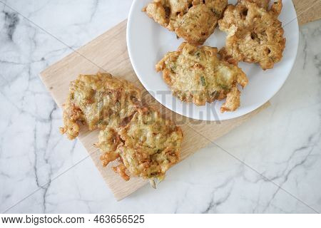 Bakwan Goreng, Fried Food, Indonesian Traditional Street Food Snacks. Fried Vegetables Dough Fritter