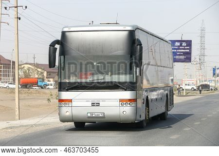 Atyrau, Kazakhstan - October 3, 2022: Intercity Coach Bus Van Hool T916 Alicron In The City Street.