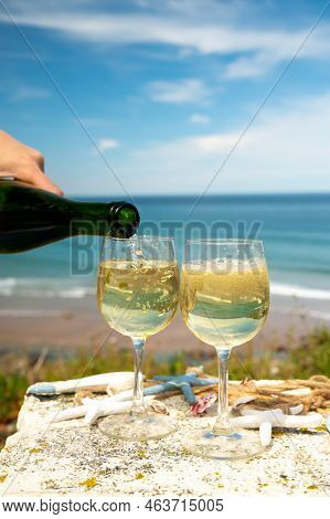 Tasting Of Txakoli Or Chacolí Slightly Sparkling Very Dry White Wine Produced In The Spanish Basque
