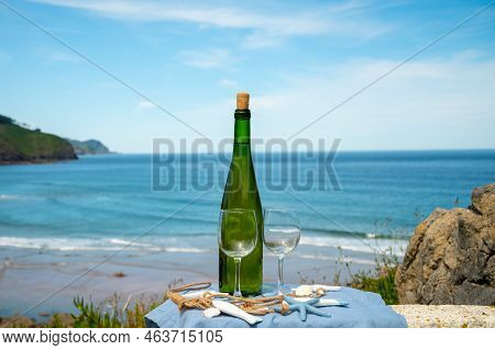 Tasting Of Txakoli Or Chacolí Slightly Sparkling Very Dry White Wine Produced In The Spanish Basque