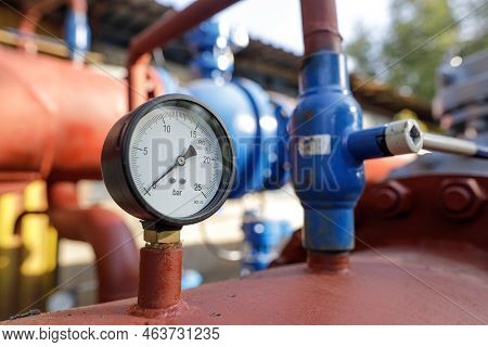 Shallow Depth Of Field (selective Focus) Details With Industrial Pressure Gauge On An Industrial Met