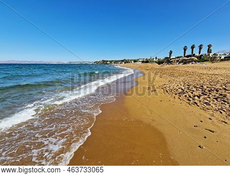 Beautiful Stalos Sandy Beach With Crystal Clear Sea In Chania Prefecture, Crete, Greece.