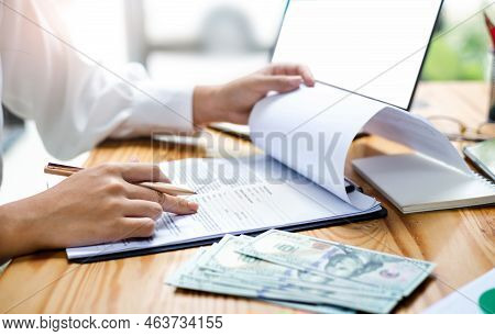 Asian Businesswoman Working In Office Checking Business Contract And Recive Money From Her Project, 