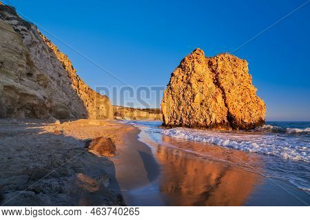 Sun-lit Rock On Fyriplaka Beach, Milos, Greece. No People, Sunset. Unique Landscape. Iconic Fyriplak