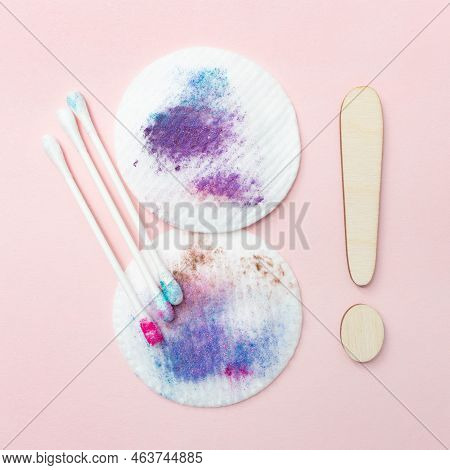Dirty Cotton Pads And Sticks After Removing Makeup. Square. Pink Background. Dirty Cosmetic Pad Afte