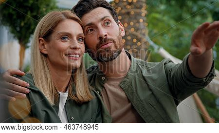Loving Married Couple Husband And Wife Caucasian Bearded Man And Blonde Woman 40s Spouses Sit Outdoo