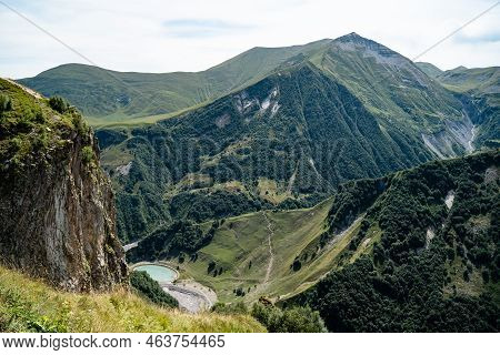 Gergeti Trinity Church Infront Of The Kaukasus Mountains In Georgia