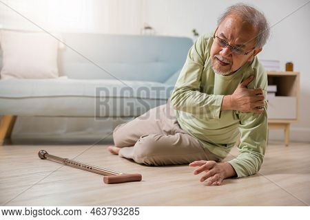 Sick Senior Old Man Falling Down Lying On The Ground Because Stumbled At Home Alone With Wooden Walk
