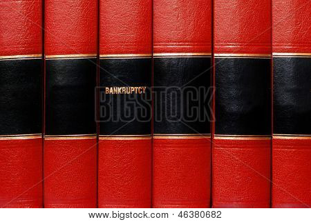 Close up of mehrere Bände Bücher über Konkurs