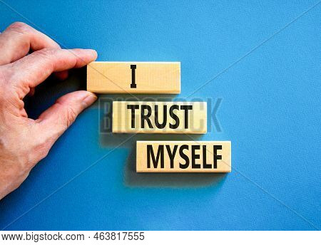 I Trust Myself Symbol. Concept Words I Trust Myself On Wooden Blocks. Businessman Hand. Beautiful Bl