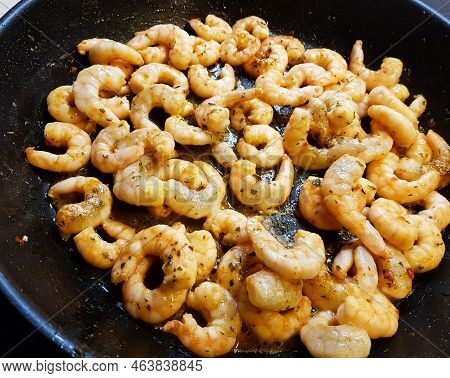 Some Fried Shrimps With Herbs And Spices