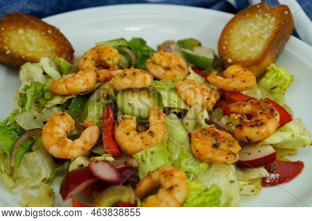 Some Fried Shrimps With Herbs And Spices