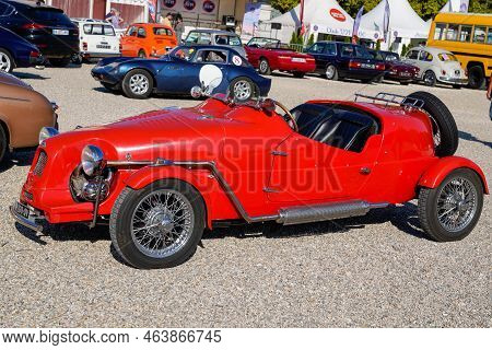 Bordeaux , Aquitaine  France - 10 18 2022 : Lomax Red Vehicle Convertible Roadster Kit Car From 2cv 