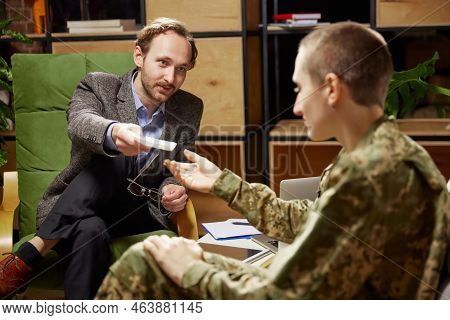 Military Person Having Therapy Session. Psychologist Consults Female Soldier. Post-traumatic Syndrom