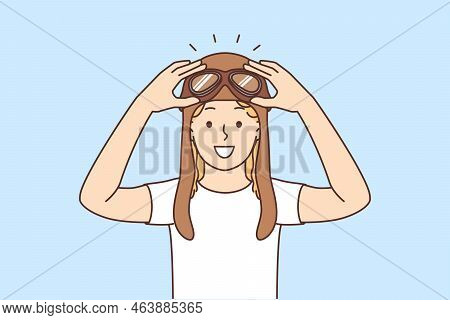 Smiling Child In Pilot Hat Excited About Future Career. Happy Kid In Aviator Headwear Plan To Be Cap